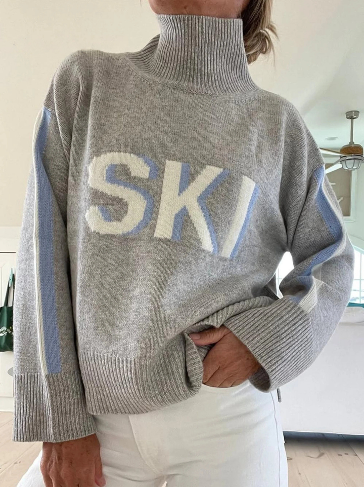 Maglione dolcevita in cashmere retrò con design da sci